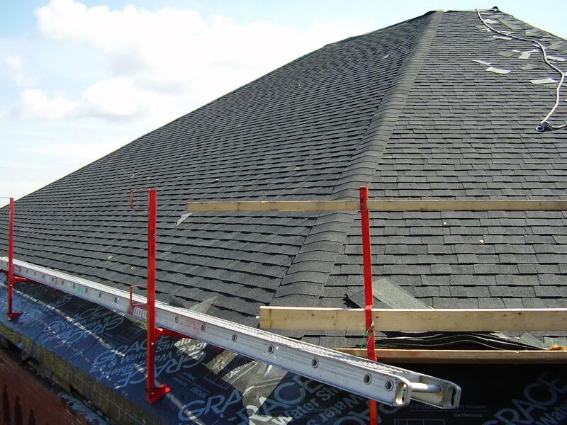 Roofing risers and close up installation of shingles on roof